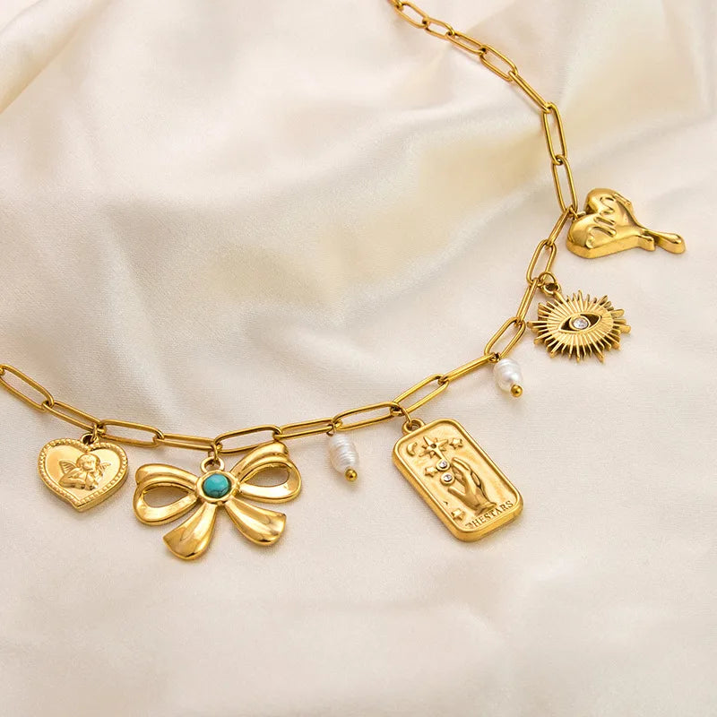 PVD Coated Real Gold Plated Devil's Eye Heart Shape Bow Knot Titanium Steel Lobster Trigger Clasp Closure Pendant Necklace